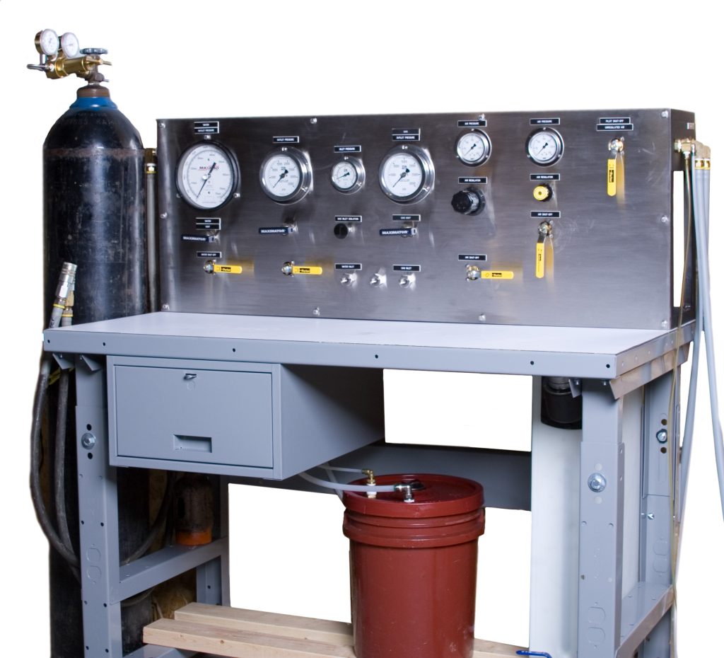 a machine with gauges and a cylinder